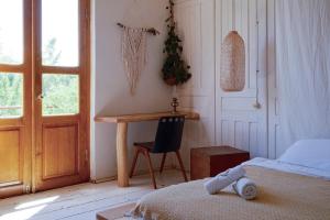 Ένα ή περισσότερα κρεβάτια σε δωμάτιο στο Karma Hostel