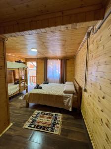 Ένα ή περισσότερα κρεβάτια σε δωμάτιο στο Guesthouse Zgiboza