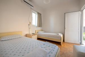 Katil atau katil-katil dalam bilik di Classic Rooms