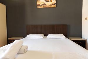 Katil atau katil-katil dalam bilik di Classic Rooms