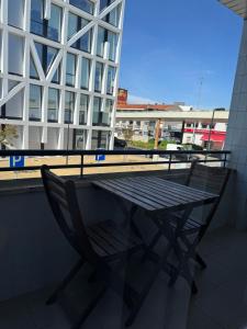 En balkon eller terrasse på Madorninha Urban Nest
