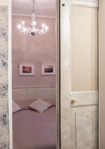 A bed or beds in a room at Costa Bed and Breakfast