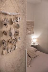 A bed or beds in a room at Costa Bed and Breakfast