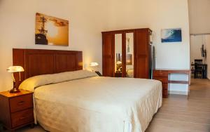 Voodi või voodid majutusasutuse Saba Arawak Hotel toas