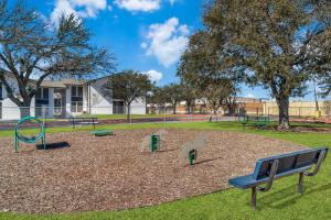 a playground with benches in a park at Stratton 2501f I Comfy 2 Bed 2 Bath in Arlington