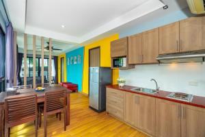ครัวหรือมุมครัวของ Anchan Boutique Hotel