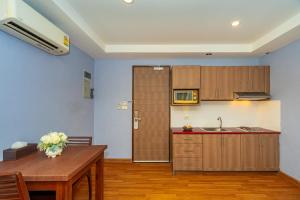 ครัวหรือมุมครัวของ Anchan Boutique Hotel