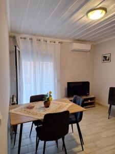 TV a/nebo společenská místnost v ubytování Villasabella 2 Apartments
