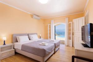 Posteľ alebo postele v izbe v ubytovaní Villa Yolanda by Villa Plus