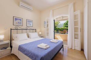 Posteľ alebo postele v izbe v ubytovaní Villa Yolanda by Villa Plus