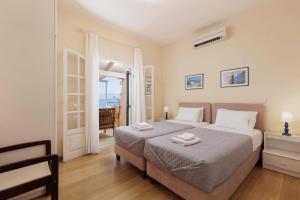 Posteľ alebo postele v izbe v ubytovaní Villa Yolanda by Villa Plus