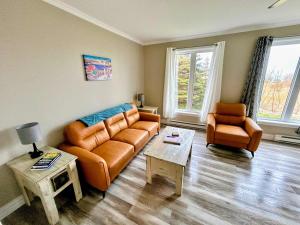 O zonă de relaxare la Look Sea Cottage