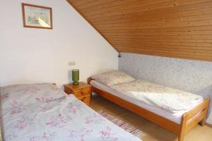 Postel nebo postele na pokoji v ubytování Leitingerhof