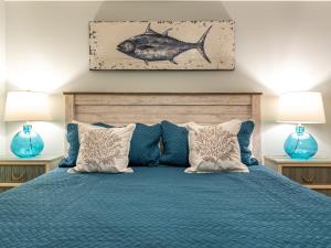 Ένα ή περισσότερα κρεβάτια σε δωμάτιο στο Ocean Song 314 +27 φωτογραφίες