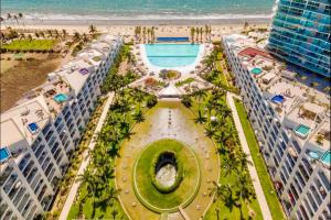 an aerial view of a resort with a pool and the beach at Apartamento Luxury Nayarit vista al mar Mexico in Nuevo Vallarta 