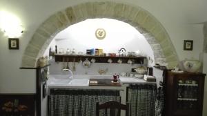 Kuchyň nebo kuchyňský kout v ubytování Trulli Resort Monte Pasubio Trulli bbalberobellocom
