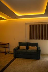 a living room with a couch and a window at Palmarito Beach Hotel in Tierra Bomba +68 photos
