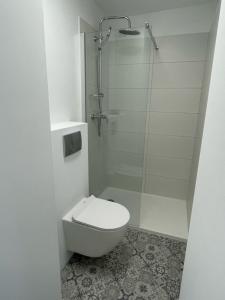 Kúpeľňa v ubytovaní Apartamenty Studio
