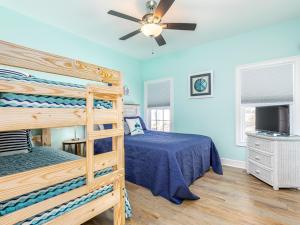 Ένα ή περισσότερα κρεβάτια σε δωμάτιο στο Bay View Villas 101 +38 φωτογραφίες