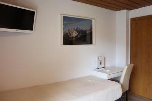Televízia a/alebo spoločenská miestnosť v ubytovaní Panorama Appartements Mora - 3 Edelweiß Superior