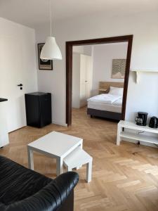 Posteľ alebo postele v izbe v ubytovaní Apartamenty Studio