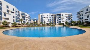 Bazén v ubytování Appartement luxueux - Piscines, Plage 300m, Résidence fermée nebo v jeho okolí