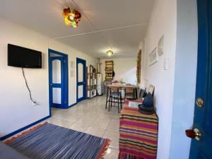 TV a/nebo společenská místnost v ubytování Lodging Incógnita, Punta Arenas