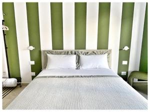 Postel nebo postele na pokoji v ubytování Nausicaa 12