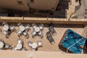 an overhead view of a group of tables and chairs at Villa Belvedere in Lokva Rogoznica