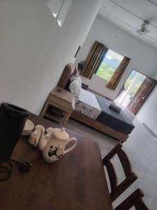 Postel nebo postele na pokoji v ubytování National Park Belebar Studio - Kuala Tahan