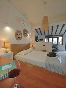 Postel nebo postele na pokoji v ubytování Del Sol Suites