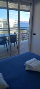 A bed or beds in a room at Appart Cosy T3 (Vue Mer et Piscine 4-5 pers)
