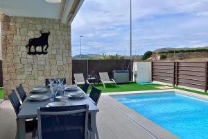 Πισίνα στο ή κοντά στο Modern villa with private pool at Golf Vistabella