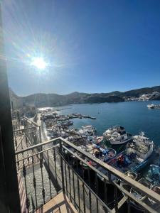 a view of a harbor with boats in the water at Agenzia Isotur LOCANDA NONNA GIULIA 31 VISTA MARE- Soppalcata in Ponza