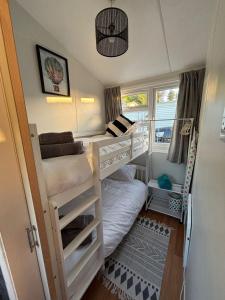 Ένα ή περισσότερα κρεβάτια σε δωμάτιο στο Welsh Bayview Retreat +61 φωτογραφίες