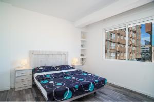 Ένα ή περισσότερα κρεβάτια σε δωμάτιο στο Ecos del Mar - Thalassa