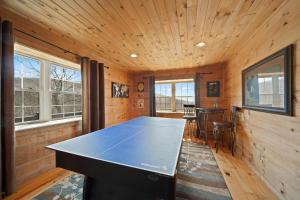 a ping pong room with a ping pong table at Western Wonder in Beech Mountain