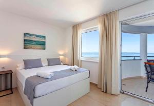 Posteľ alebo postele v izbe v ubytovaní Sunset Split Rooms