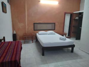 Postel nebo postele na pokoji v ubytování Casa Azul