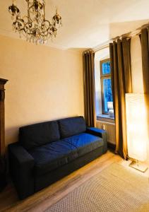 Posezení v ubytování Privatzimmer in 4 Zimmer EG Wohnung in Altchemnitz