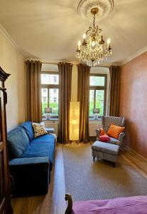 Posezení v ubytování Privatzimmer in 4 Zimmer EG Wohnung in Altchemnitz