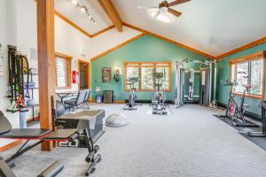 a gym with treadmills and exercise equipment at half Mi to Dtwn Frisco Mtn-View Condo with Pool! in Frisco