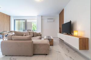 TV a/nebo společenská místnost v ubytování BLACK MOON Apartments