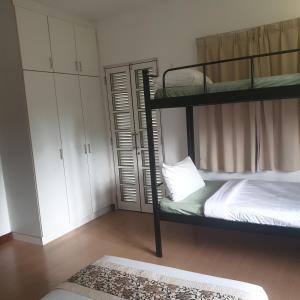 Postel nebo postele na pokoji v ubytování 5 Twenty @ Ampang Hilir