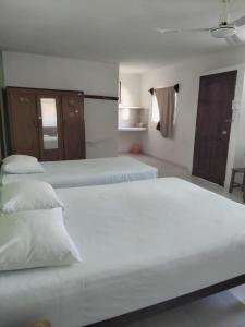 Postel nebo postele na pokoji v ubytování Casa Azul