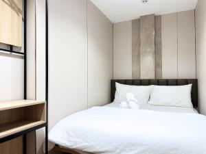 Ένα ή περισσότερα κρεβάτια σε δωμάτιο στο Nest Hotel Singapore