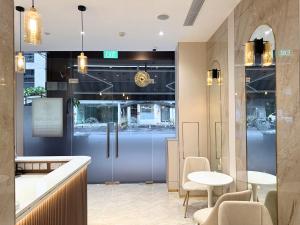 Kuchyň nebo kuchyňský kout v ubytování Nest Hotel Singapore