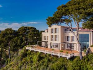 an aerial view of a house on a hill at Villa du Littoral in Grimaud