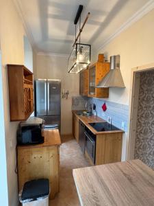 Kuchyň nebo kuchyňský kout v ubytování Privatzimmer in 4 Zimmer EG Wohnung in Altchemnitz