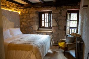 Postel nebo postele na pokoji v ubytování Casa Rural a 15 min de Comillas